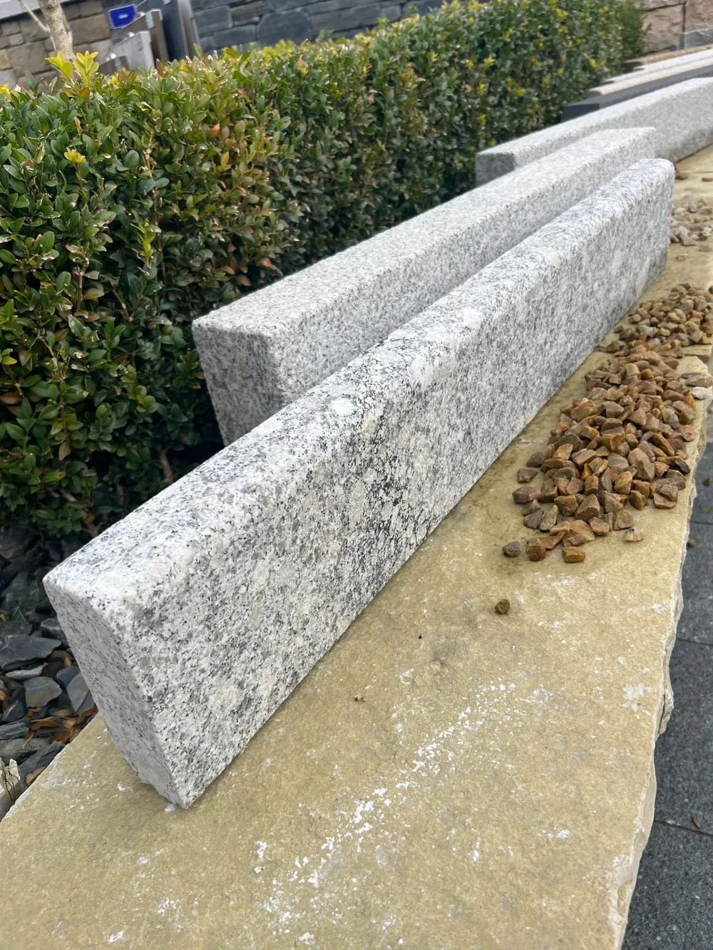 Kerbstones along a planted edge